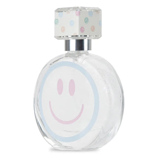 Clear perfume bottle with smiley face design on a white background