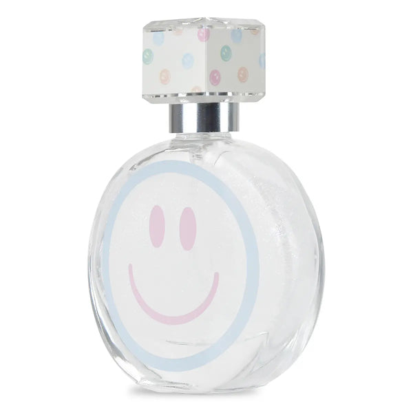 Clear perfume bottle with smiley face design on a white background