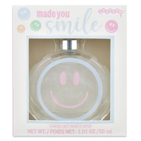 Perfume bottle with smiley face design in a 'made you smile' branded box.