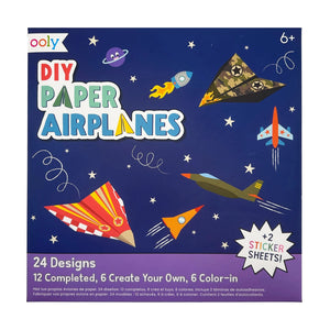 Ooly DIY Paper Airplanes kit packaging with colorful paper airplanes on a blue background